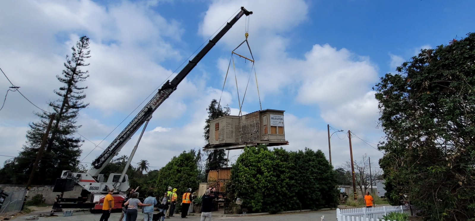 The 1895 Queen Anne known as 3024 is lifted by crane into place at La Venezia Court in Altadena.